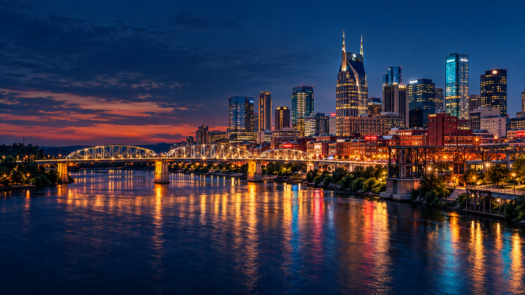 Nashville skyline and river glowing at blue hour